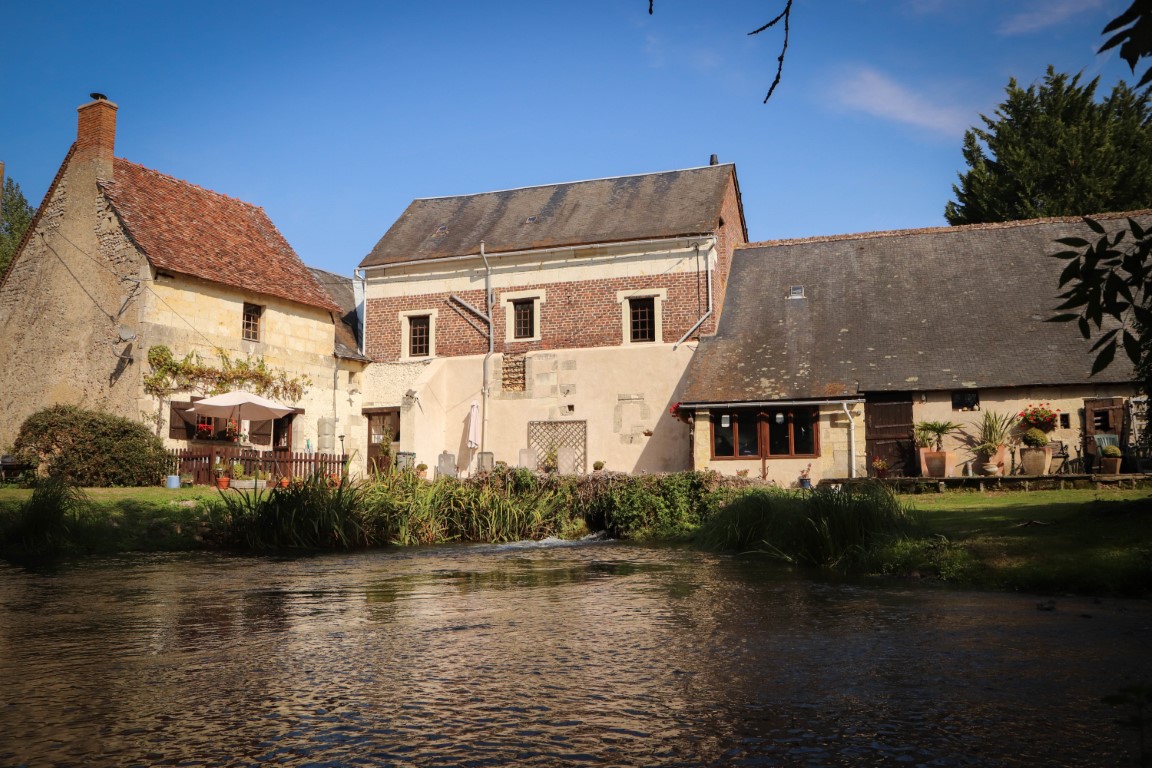 Mill pond and grounds at Moulin St Blaise watermill Chahaignes